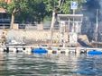 Le immagini della moto d'acqua in fiamme al pontile di Angera