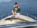 Il pesce siluro e il suo giovane pescatore