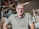Silvano Contini al lavoro in falegnameria