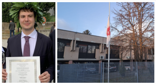 Il dottor Enrico Ferri nel giorno della sua laurea e le bandiere a mezz'asta fuori dalla sede della Croce Rossa del Medio Verbano di Gavirate Il dottor Enrico Ferri nel giorno della sua laurea e le bandiere a mezz'asta fuori dalla sede della Croce Rossa del Medio Verbano di Gavirate