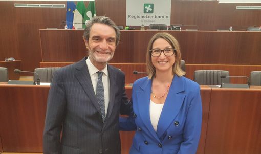Romana Dell'Erba col governatore Attilio Fontana e, sotto, col presidente del Consiglio regionale Federico Romani Romana Dell'Erba col governatore Attilio Fontana e, sotto, col presidente del Consiglio regionale Federico Romani