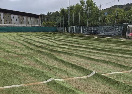 Quel che resta del campo in sintetico dove giocava la Cairese dopo l'alluvione a Cairo Montenotte (Savona) in Val Bormida
