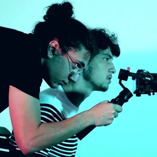 Un dettaglio del &quot;dietro le quinte&quot; di Anno Zero, con Gianluca Parisi, la sua videocamera e Lorenzo Montes (nel ruolo di Adam)