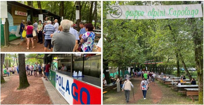 In fila una domenica di luglio ad attendere di gustare sulle tavolate nel bosco i piatti semplici e ruspanti della Festa degli Alpini di Capolago