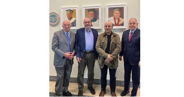 Da sinistra: Renzo Dionigi, Alberto Coen Porisini, Luca Del Baldo, Angelo Tagliabue davanti ai ritratti