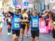 Paolo Bossi, oncologo specialista dei tumori testa-collo, e Giovanni Pignataro, avvocato e consigliere comunale a Gallarate: esultanza all'arrivo della Milano Marathon