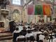 L'arcivescovo Delpini fra i bambini, in San Giovanni. Nel riquadro, dettaglio della nuova opera Urbansolid nella sede della cooperativa Rezzara, in via Miani