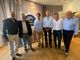 Luca Ferrazzi, secondo da sinistra, con Piero Galparoli e Daniele Parisi, referenti dei comitati varesini accanto a lui, nella sede di Futuro Nazionale in via Sanvito