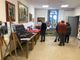 L'inaugurazione della mostra &quot;Arte, passione e solidarietà&quot; nella sede della Cisl di Besozzo