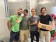 Ivan, Battista, Simone e Mattia nella sala di produzione della Mia Kombucha a Induno. Insieme a Gabriele portano avanti un'impresa che sta conquistando il palato di sempre più italiani