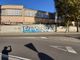 Un mega murales sul muro dell'azienda Ratti. Pellicini: «Il Comune intervenga con la proprietà per cancellarlo»