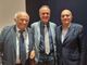 Giancarlo Pagliarini, Marco Reguzzoni e Gabriele Albertini. Nella foto in basso, un momento del convegno di ieri sera all'Auditorium Baldoni di Milano Bonola