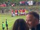 Antonio Rosati felice e, là dietro, il mucchio biancorosso che esulta sotto i tifosi giunti a Gozzano dopo il gol al 95' di Giulio Ebagua