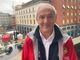 Renzo Oldani sul balcone della Camera di Commercio dopo la 103ª  Tre Valli sospesa dai corridori