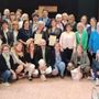 Una parte dei 98 infermieri premiati e, sotto, il presidente dell’Ordine delle Professioni Infermieristiche di Varese Salvatore Santo