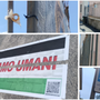 Striscione spezzato a metà per terra in via Sacco, a fianco di Palazzo Estense Striscione spezzato a metà per terra in via Sacco, a fianco di Palazzo Estense