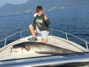 Il pesce siluro e il suo giovane pescatore Il pesce siluro e il suo giovane pescatore