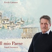 Ercole Cattaneo con la copertina del suo libro su Besozzo Ercole Cattaneo con la copertina del suo libro su Besozzo
