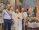 Don Emilio al centro (foto tratta dal sito della comunità pastorale Maria Madre della Chiesa)