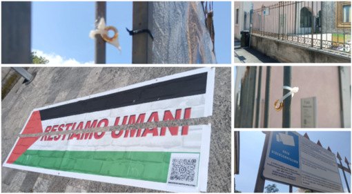 Striscione spezzato a metà per terra in via Sacco, a fianco di Palazzo Estense Striscione spezzato a metà per terra in via Sacco, a fianco di Palazzo Estense