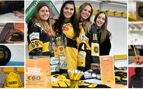 Il banchetto del merchandising dei Mastini gestito da Elena Parascenzo dell'Arcobaleno di Nichi, terza da sinistra