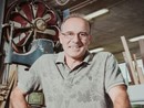 Silvano Contini al lavoro in falegnameria