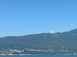 I vigili del fuoco impegnati nelle operazioni di recupero del cadavere a Caldè