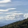 Le nubi di questa mattina viste dal Campo dei Fiori lasceranno spazio a una domenica di sole