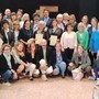 Una parte dei 98 infermieri premiati e, sotto, il presidente dell’Ordine delle Professioni Infermieristiche di Varese Salvatore Santo