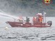 FOTO. Motoscafo abbordato e barca in fiamme: spettacolare esercitazioni sulle acque del lago Maggiore